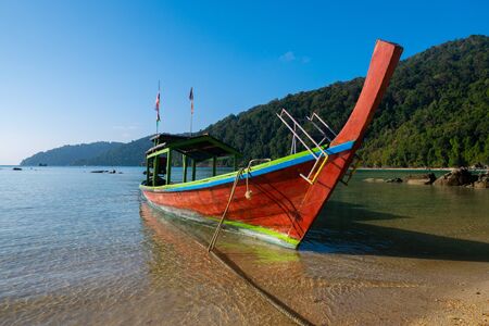 Longtale boats on the beautiful tropical sea  beach, Surin island, Thailandの写真素材