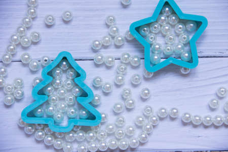 The Christmas card for the congratulations. The Christmas background with the beads and the toys.の写真素材