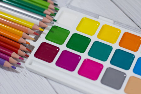 The child's school supplies on a white background. Picking up the child for schoolの写真素材