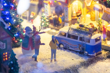 a miniature winter town model on display in a toy storeの写真素材