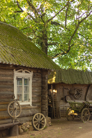 Old restored country house in the estate. Stone building in the countryside in the summer after restorationの写真素材