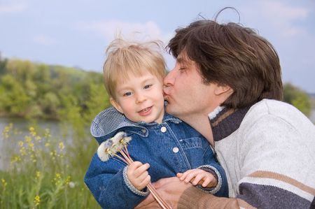 father kiss his little sonの写真素材