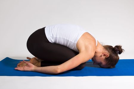 young attractive yoga girl doing exericiseの写真素材