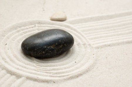 zen garden of sand and stones with copyspace