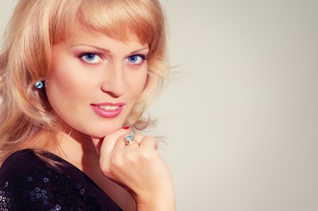 beautiful smiling blond woman isolated on white backgroundの写真素材