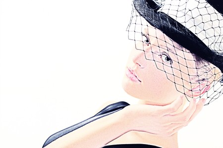 elegant young woman with hat の写真素材