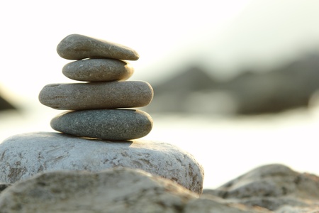 balanced stones over sea nature background