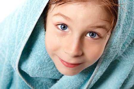 little boy beautiful after shower with bath towel and bathrobeの写真素材