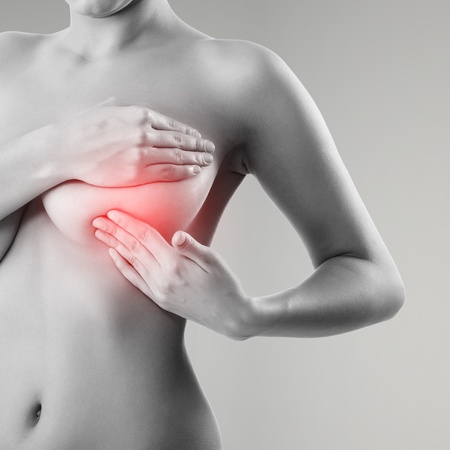 woman examining breast mastopathy or cancer の写真素材