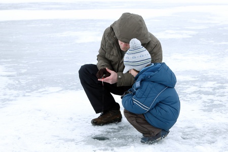 winter fishing family leisure outdoorの写真素材
