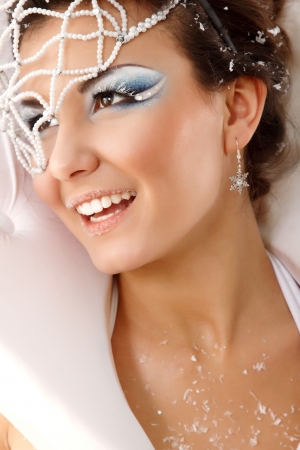 portrait of christmas woman young beautiful sexy happy smilingの写真素材