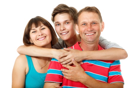 Mother, father with son teenager. Happy caucasian family having fun and smiling over white...