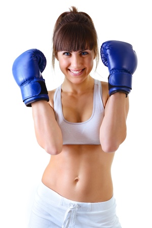 sport young woman with perfect body in boxing gloves, fitness girl studio shot over white backgroundの写真素材