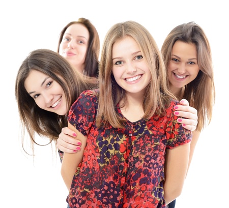 group of happy teen girls, over white backgroundの写真素材