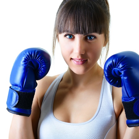 sport young woman boxing gloves, face of fitness girl studio shot over white backgroundの写真素材