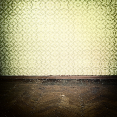 Vintage room, empty retro apartment with old fashioned wallpaper and weathered wooden parquet floor, tonedの写真素材
