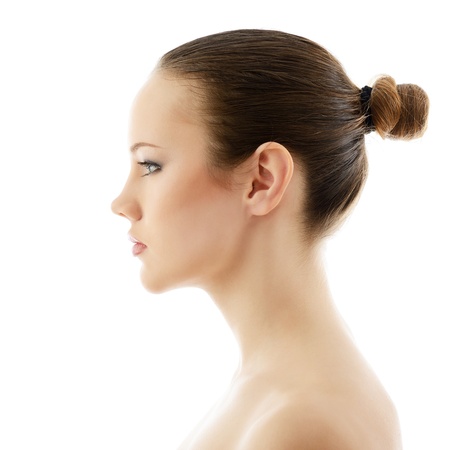 girl beauty, portrait of beautiful young fresh woman in profile, over white background の写真素材