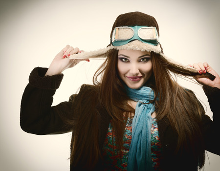 portrait of beautiful young woman aviator, tonedの写真素材