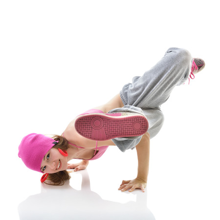 Teen girl hip-hop dancer over white backgroundの写真素材