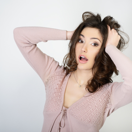 Surprised attractive teen girlの写真素材