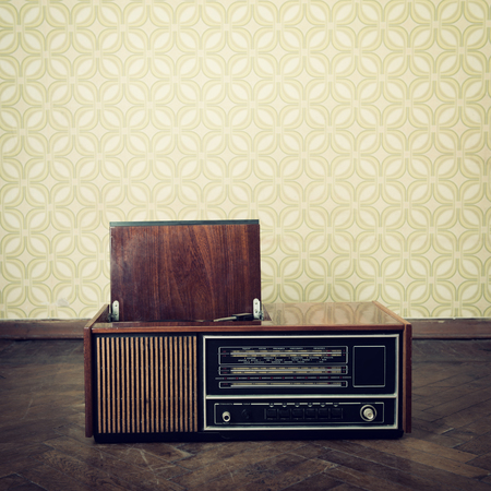 Retro record and radio player, detail shot. Vinyl. Vinyl record.の写真素材