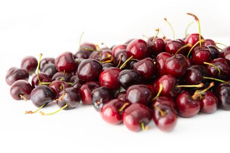 Fresh raw ripe juicy sweet cherries, soft focus. Farm seasonal spanish fruits and vegetablesの写真素材