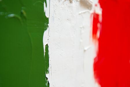 Painted flag of Italy. Italian tricolor. Abstract vivid green white red background, oil on canvas, creative design element with perfect texture, soft focusの写真素材
