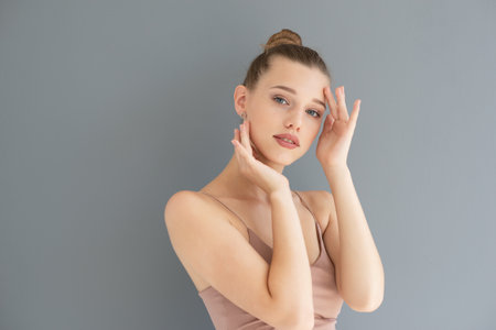 Portrait of a beautiful young woman with clean skin, beauty treatment, cosmetology and anti-aging themeの写真素材