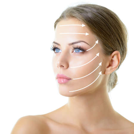 Grid of lines showing facial lifting effect on skin of beautiful young woman with healthy face and...
