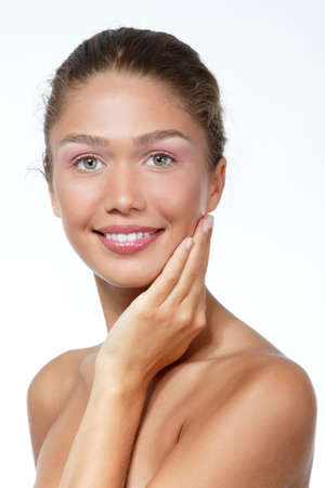 Portrait of a beautiful young woman with clean skin and soft day makeup, beauty treatment, cosmetology and anti-aging themeの写真素材