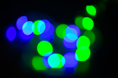 Beautiful decor with Christmas  lights, blur holiday night abstract backgroundの写真素材