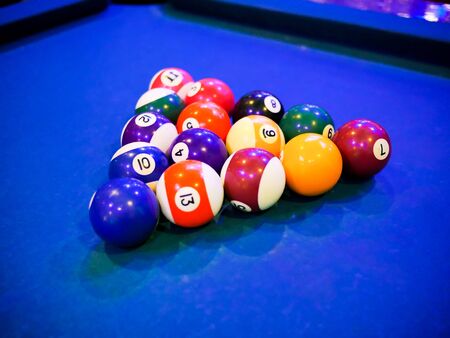 Billiards ball on pool blue tableの写真素材