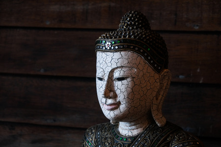 Crack face Buddha Statueの写真素材