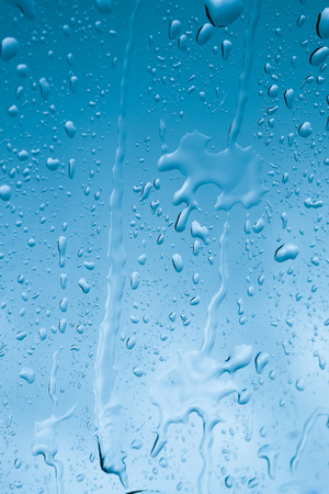 water drops on glassの写真素材