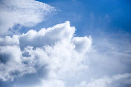 Clear blue sky with cloudの写真素材