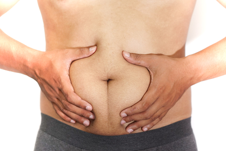 Belly fat stomach with grey black underwearの写真素材