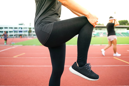 female woman exercise running at sport stadium