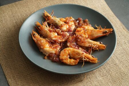 Stir Fried Shrimp with Tamarind Sauce with studio light delicious lookingの写真素材