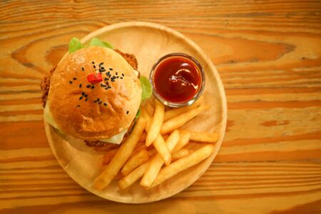 hamburger and chip tomato ketchup dip on wood tableの写真素材