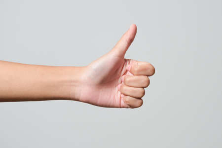 hand thump up sign isolated on white background