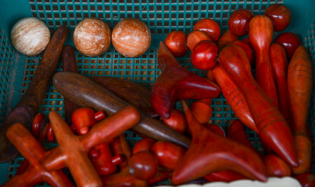 Wooden massage equipments on the basket tableの写真素材
