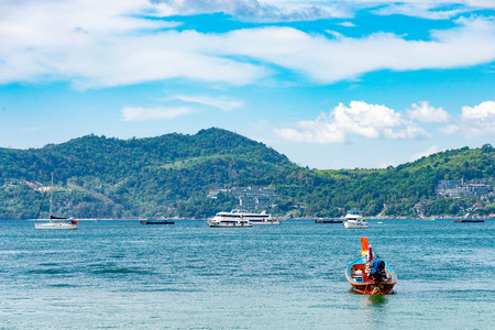 Summer concept,Phuket, Thailand - January 20,2018: colorful of small ship are boarding long tail boat for day tour at Patong beach, Phuket,Thailand.のeditorial素材