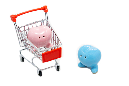 Big heart gift in shopping cart isolated on white backgroundの写真素材
