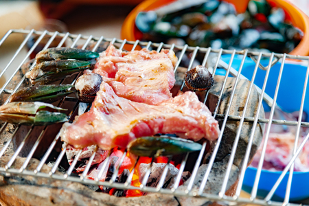Korean BBQ,pork,sea food grilled in korean restuarantの写真素材