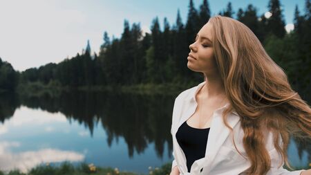 Beautiful young blonde woman with natural appearance portrait shooting