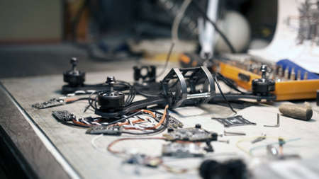 Man constructs a FPV drone from partsの写真素材