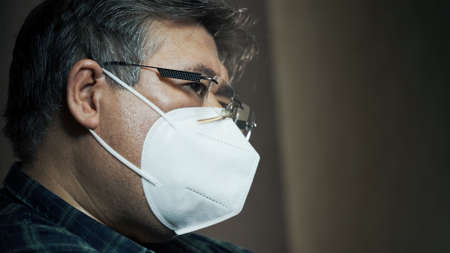 Portrait of asian man with glasses and mask. Pandemia covid virusの写真素材