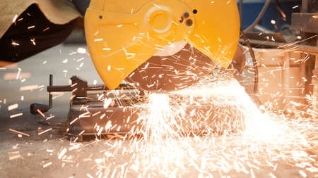 Sawing with a circular saw metal, many sparks. Safety violation