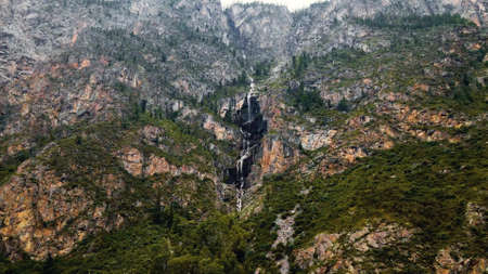 Waterfall in the rock in Altai in summerの写真素材