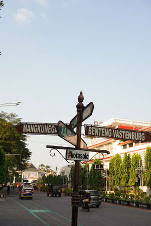 Surakarta, Indonesia - December 23, 2021: A signpost in the Solo city area that shows tourist directions in Surakarta. Beautiful solo city streetsのeditorial素材